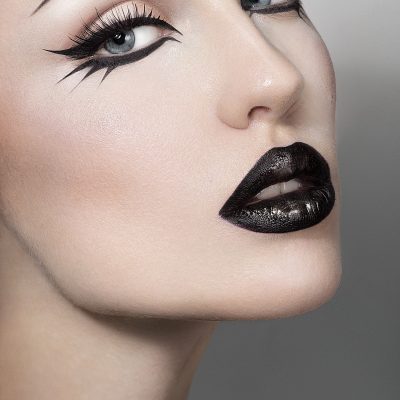 Portrait of sexy woman with black lips
